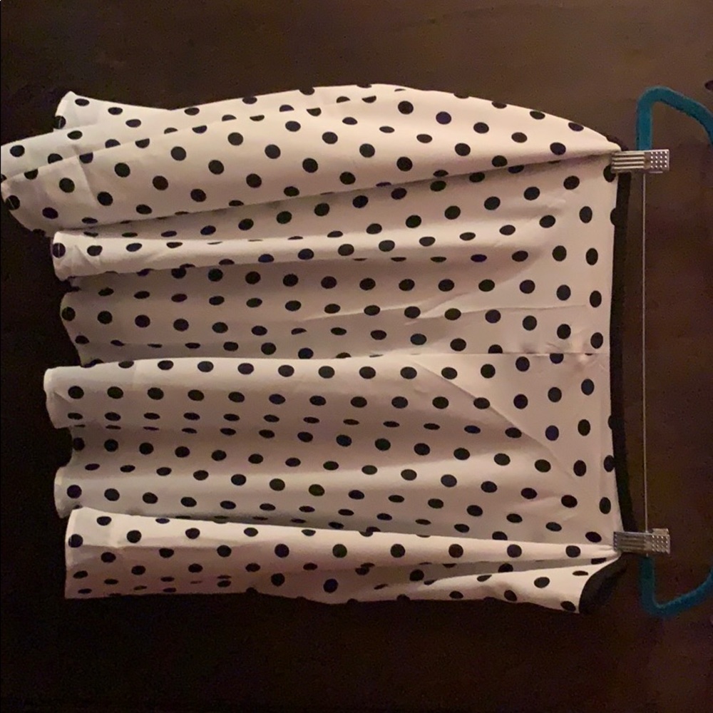 White skirt with black polkadots